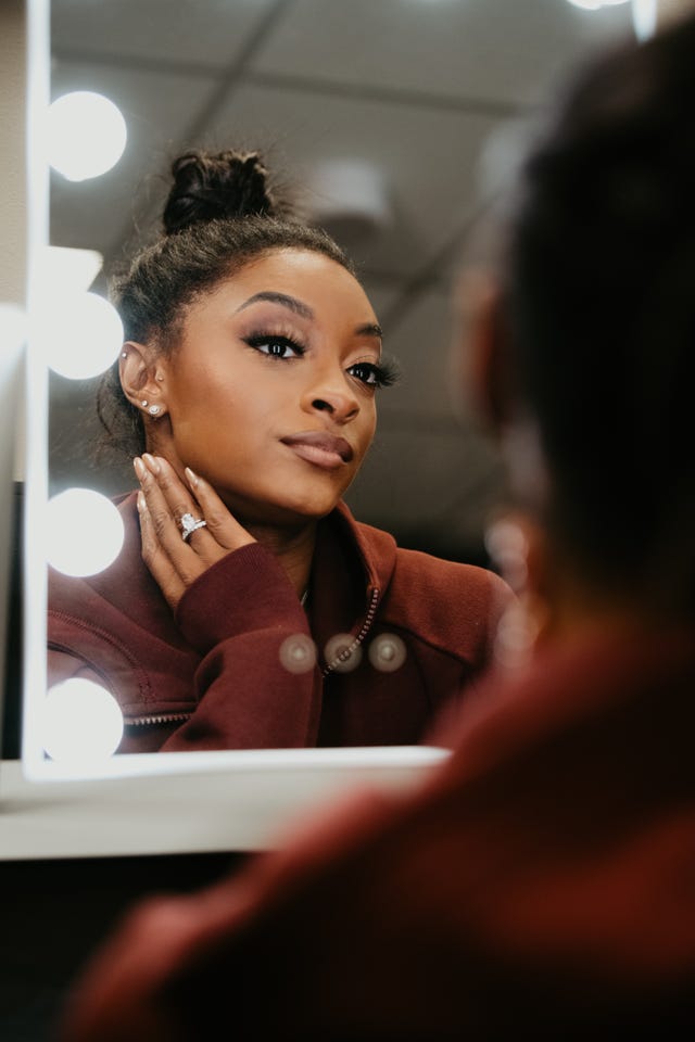 simone biles looking in mirror