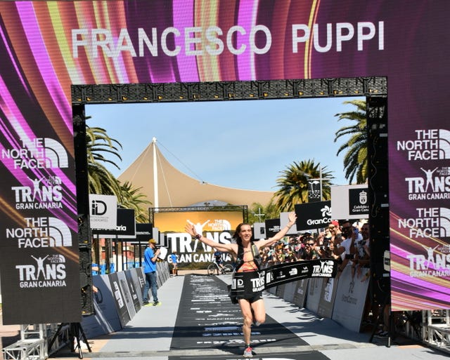 runner completing a race event at the finish line