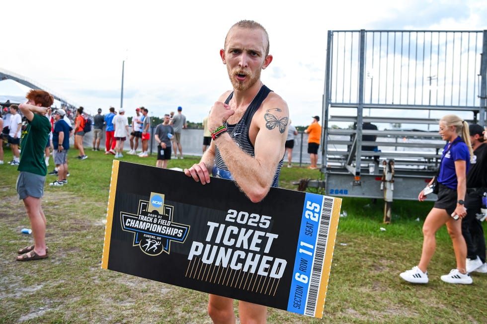 athlete celebrating an achievement holding a ticket for a future championship event