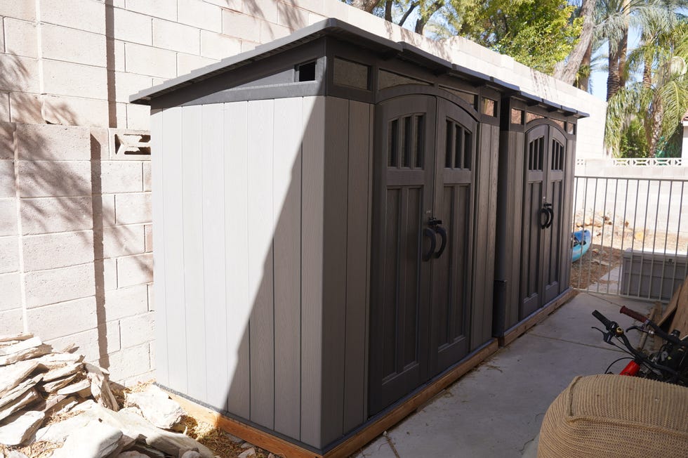 storage sheds in a backyard setting