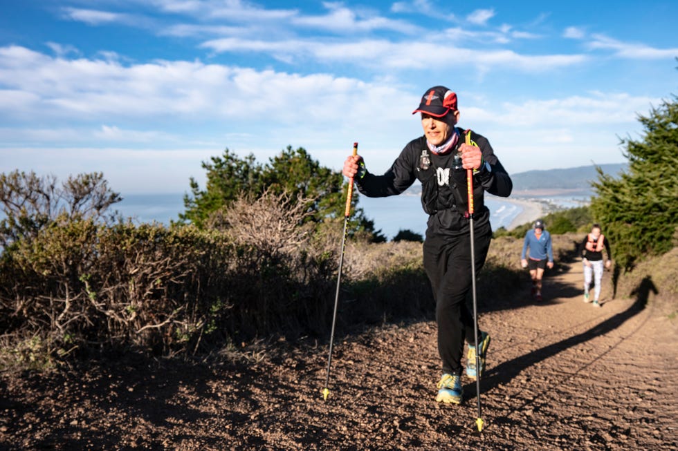 bradley fenner hiking up the dipsea trail during his quad quad dipsea