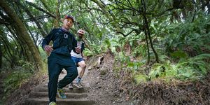 bradley fenner running down the steps of the dipsea course during his quad quad dipsea attempt
