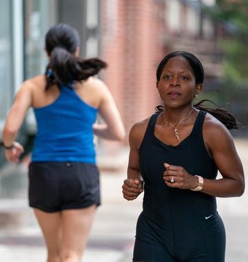 two women running in opposite directions two women running in opposite directions