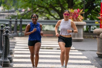 two women looking happy running