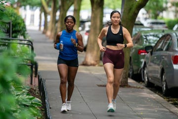 two women running together