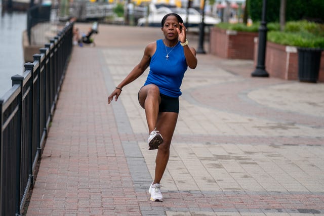 runner warming up on a walkway