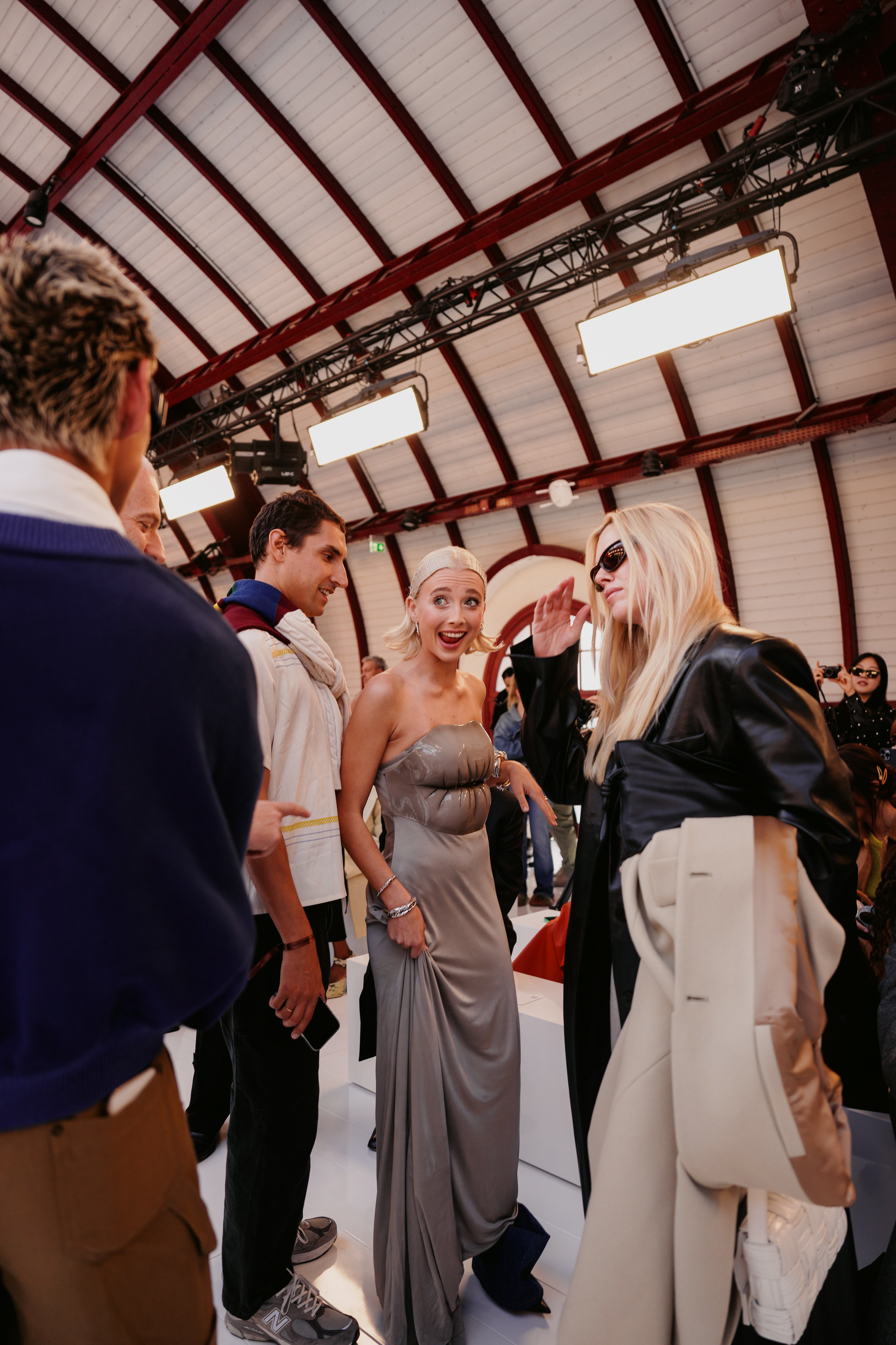 Emma Chamberlain Wears Lip Dress & Jean Boots for Loewe's Fashion Show –  Footwear News