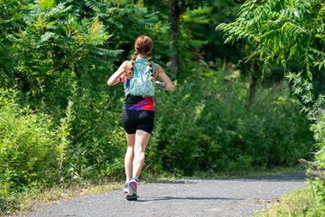 woman running on path