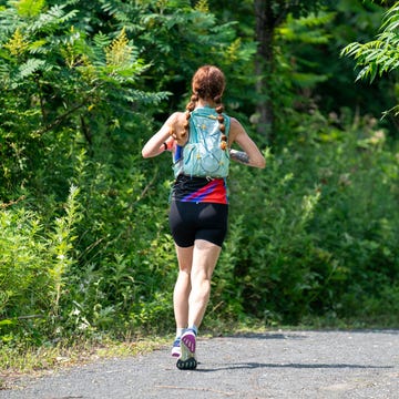 woman running on path woman running on path