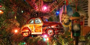 Vintage car with tree Christmas ornament