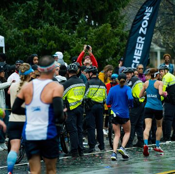 boston police block a derby of fans at the 2023 boston marathon