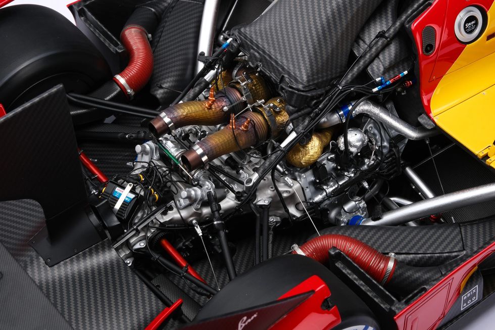 a car engine with a car hood open