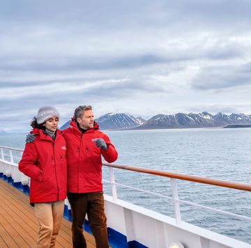 guests having a walk on the deck enjoying the view, silver cloud, bellsund, svalbard