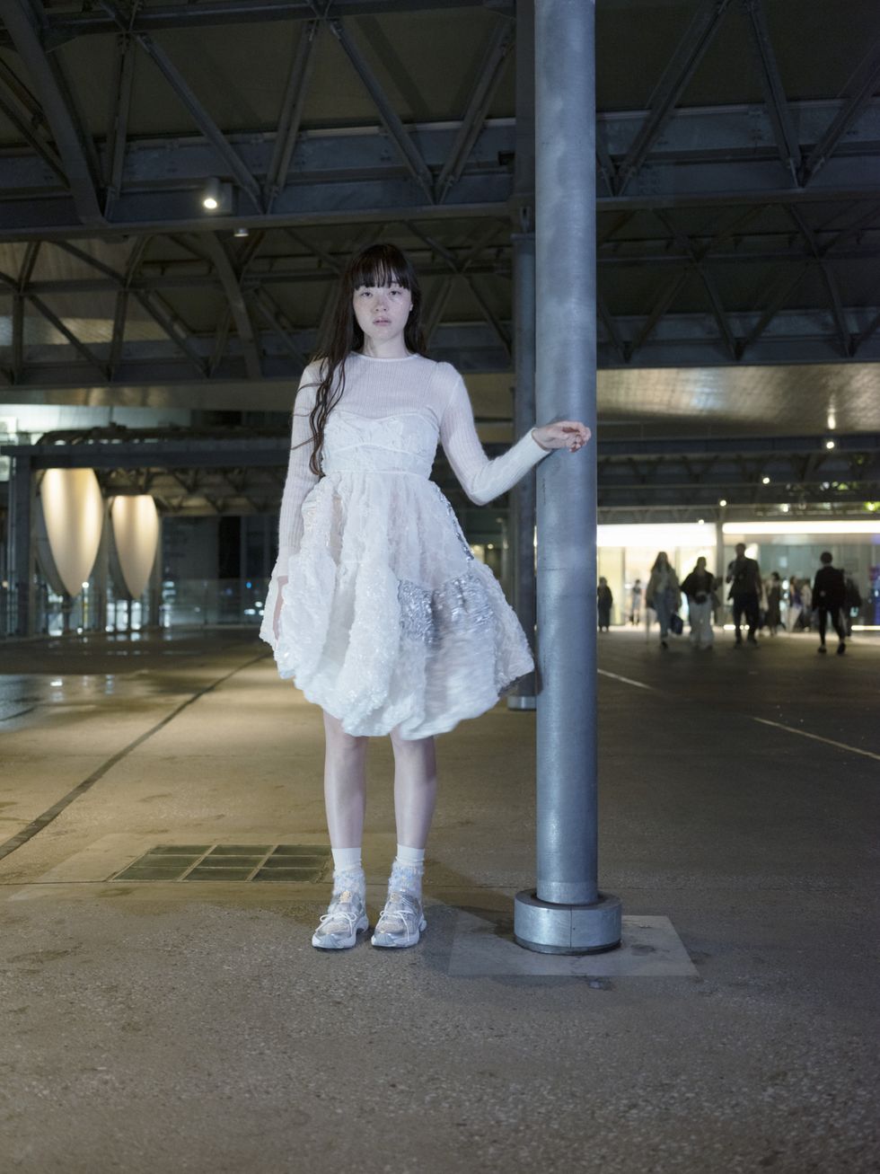 a model wears the cecilie bahnsen asics with a cecilie bahnsen dress
