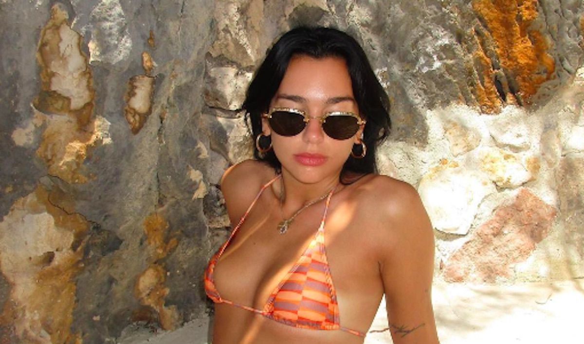 Dua Lipa Shows Off Tiny Bikini On Beach Vacation photo image