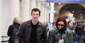 dua lipa and callum turner spotted in kings cross st pancreas station in london