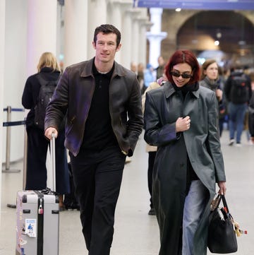 dua lipa and callum turner spotted in kings cross st pancreas station in london