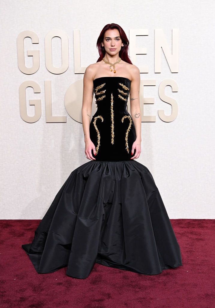 Dua Lipa Wears Black Gown At The 2024 Golden Globes