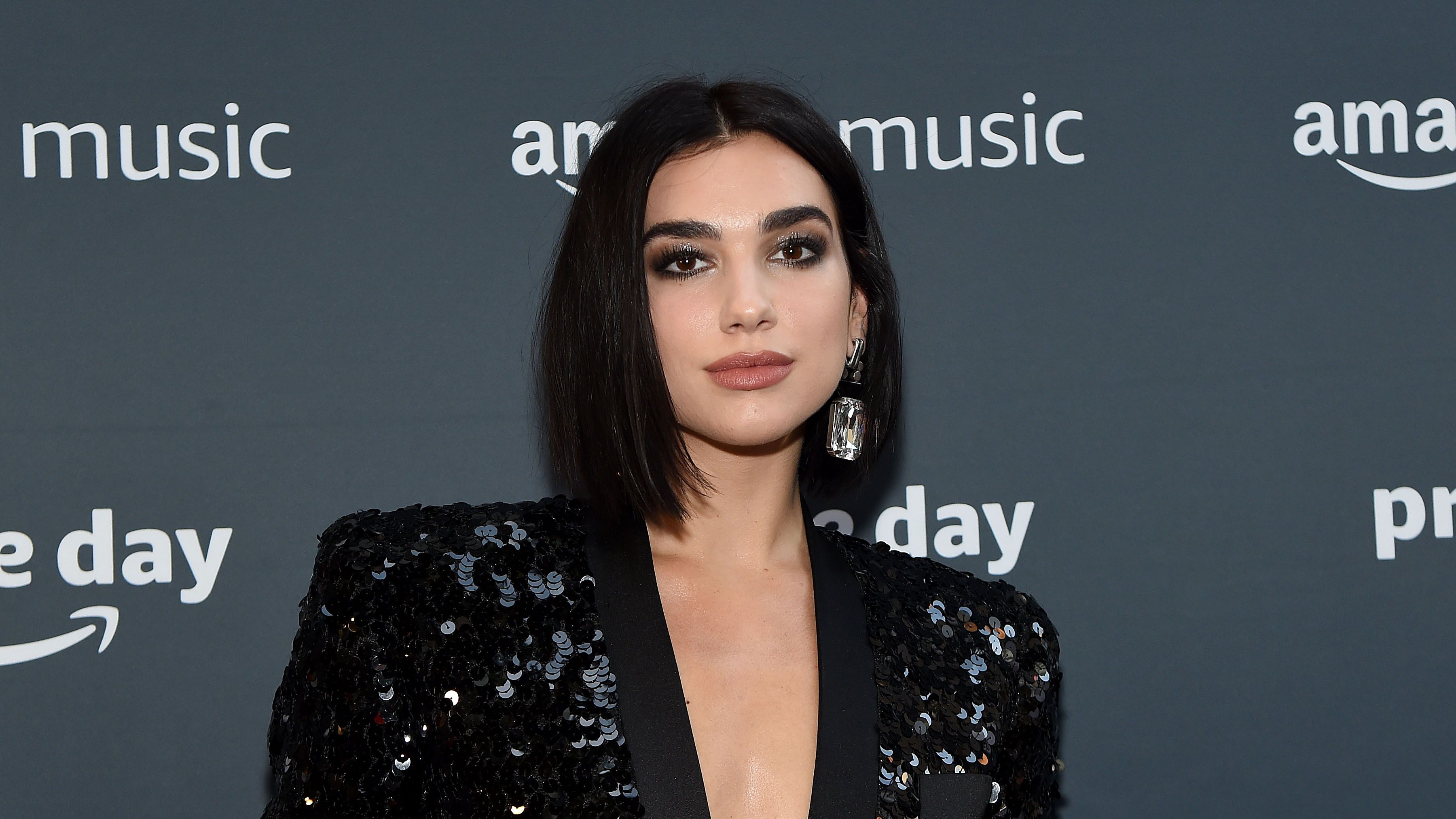 Dua Lipa's Epic Abs Are Sculpted In A Gucci bra Top In IG Pics