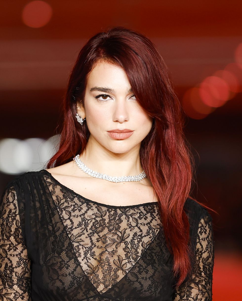 Dua Lipa Stunned in a Sheer Lace Chanel Dress and Diamonds at the 2023