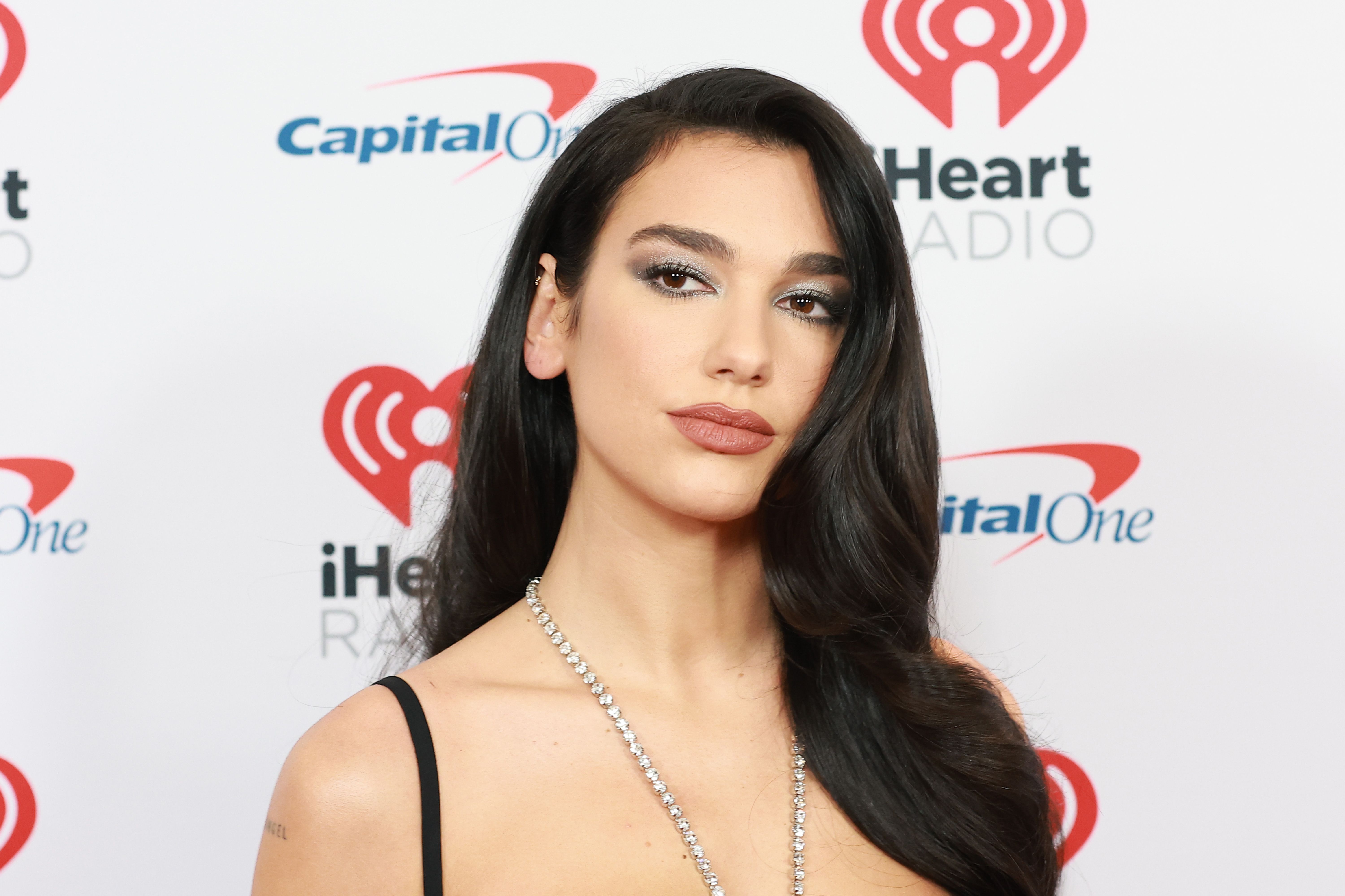 Dua Lipa Wears Sexy Black Cut Out Dress to the Jingle Ball