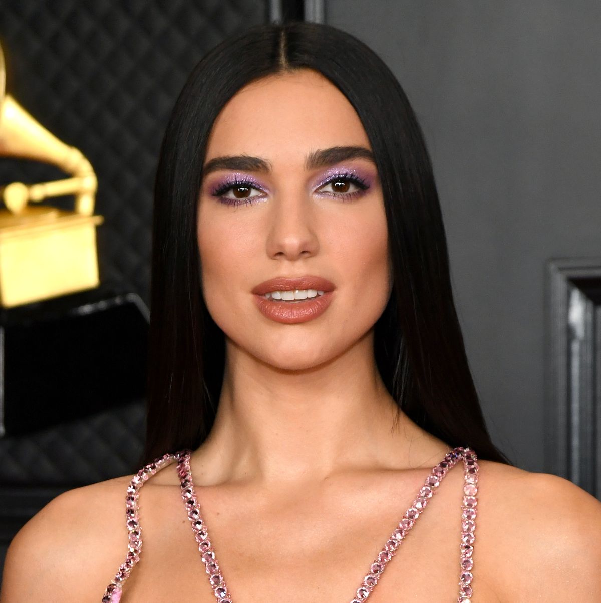Dua Lipa's 'Matrix'-Inspired Outfit Included a Hood and Glamorous