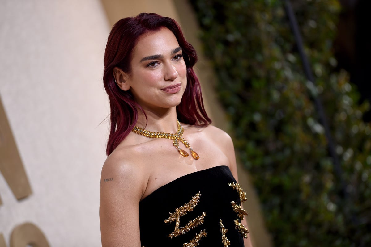 Dua Lipa wears velvet Schiaparelli gown at Golden Globes 2024