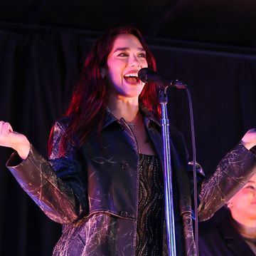 dua lipa performs in times square at surprise pop up for her new album