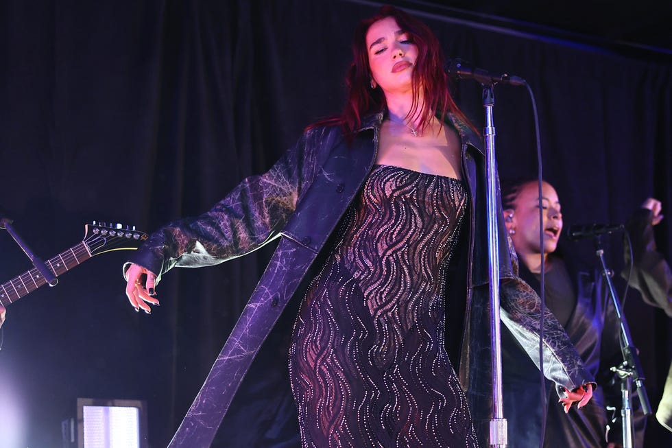 dua lipa performs in times square at surprise pop up for her new album