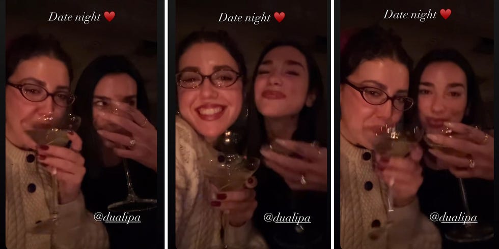 dua lipa wearing a diamond ring, with a friend