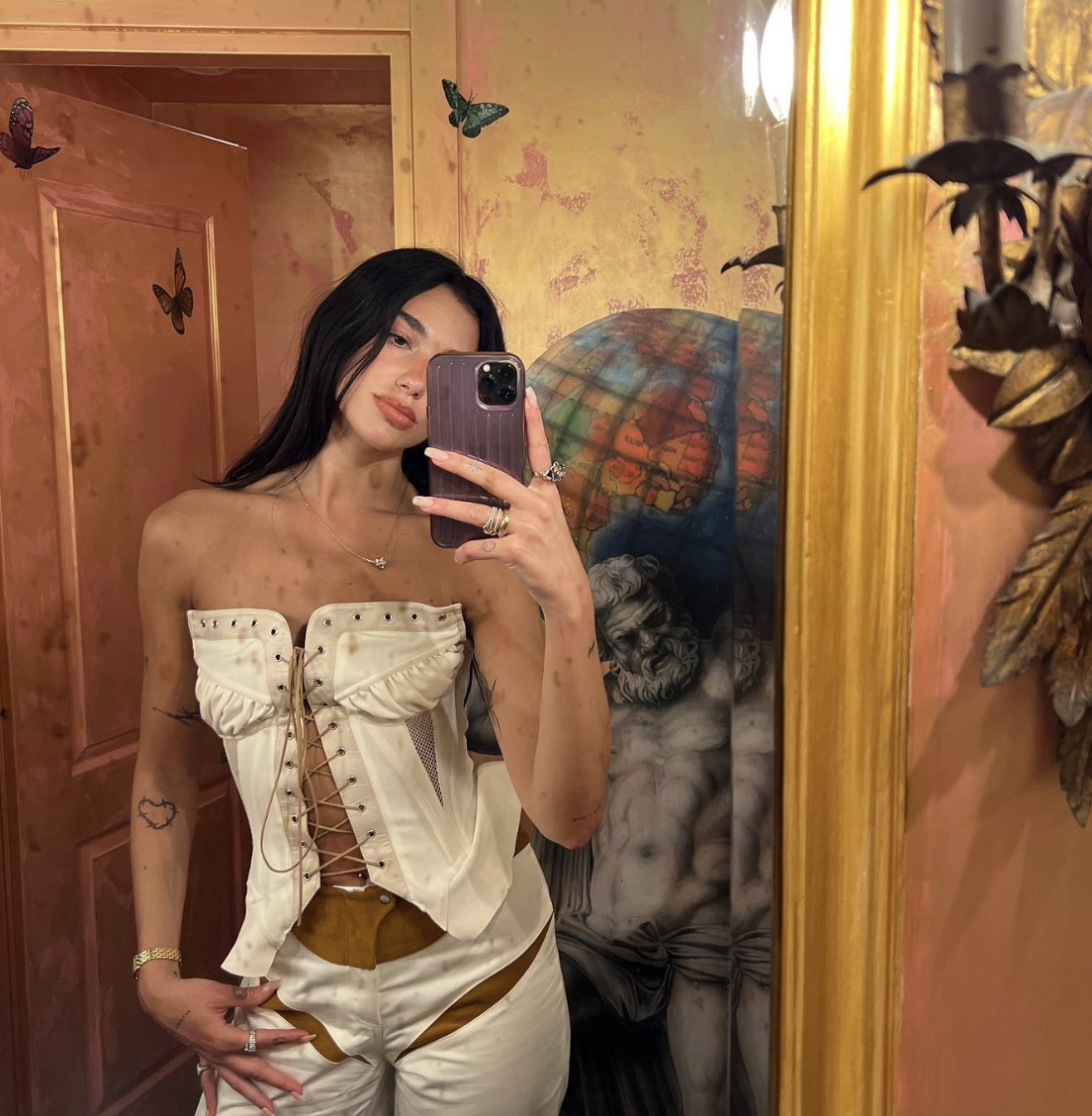 Dua Lipa's Latest Outfit Shows Off a New Corset Styling Trick