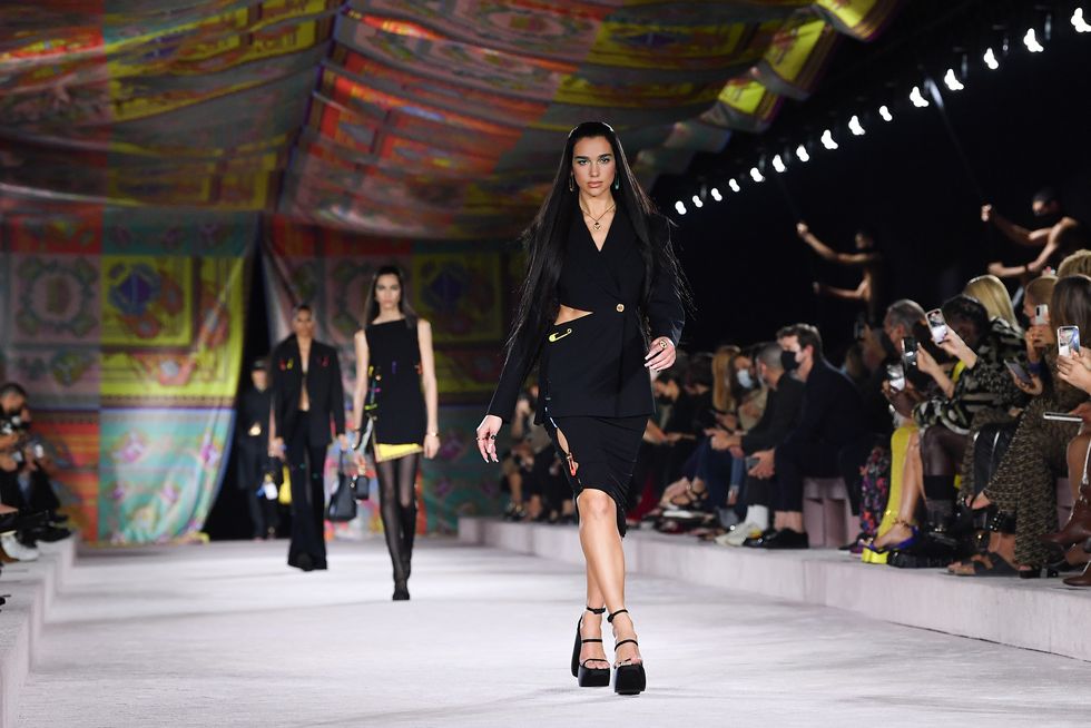 milan, italy   september 24 dua lipa walks the runway at the versace fashion show during the milan fashion week   spring  summer 2022 on september 24, 2021 in milan, italy photo by jacopo raulegetty images