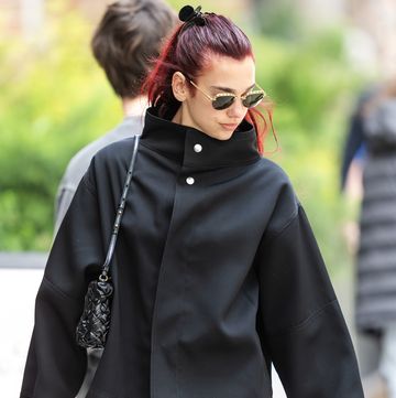 04272024 dua lipa and callum turner keep close on a stroll in new york city the 28 year old singer and songwriter walked the downtown streets keeping her arm around her beau and wearing a black coat paired with black trousers and black and white loafersvideo availablesalestheimagedirectcom please bylinetheimagedirectcom