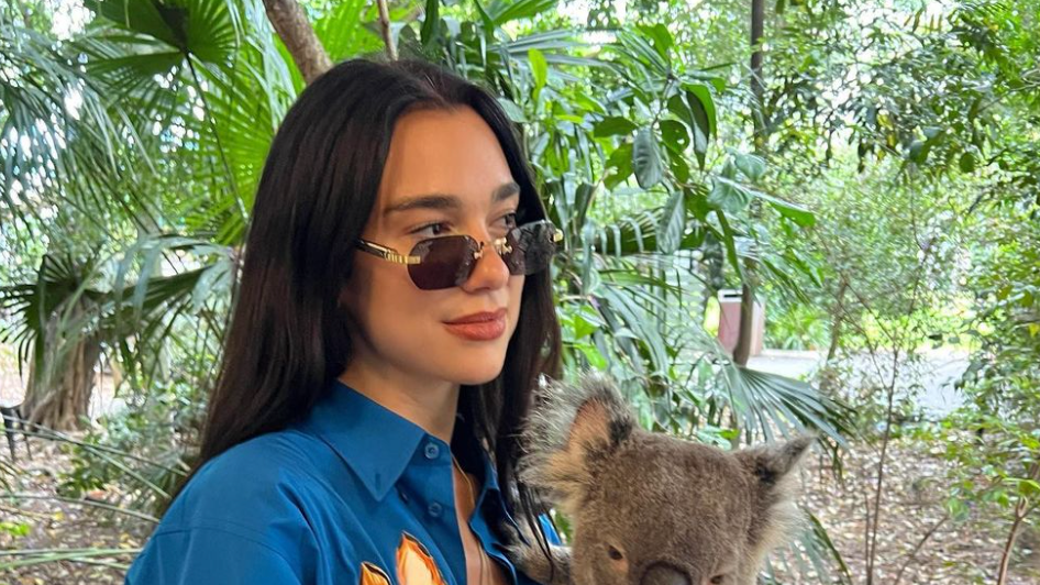 Dua Lipa Wears a Graphic Button-Down Over a Printed Bra to Visit