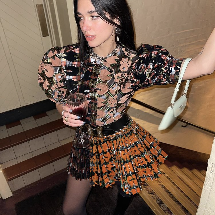 Dua Lipa Outfits 2021: Chopova Lowena minidress and boots