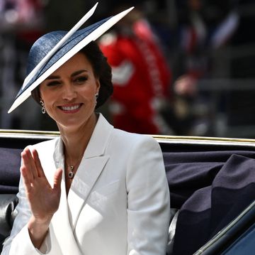 britains catherine, duchess of cambridge waves to the public as she arrives on a carriage to attend the queens birthday parade, the trooping the colour, as part of queen elizabeth iis platinum jubilee celebrations, in london on june 2, 2022   huge crowds converged on central london in bright sunshine on thursday for the start of four days of public events to mark queen elizabeth iis historic platinum jubilee, in what could be the last major public event of her long reign photo by ben stansall  afp photo by ben stansallafp via getty images