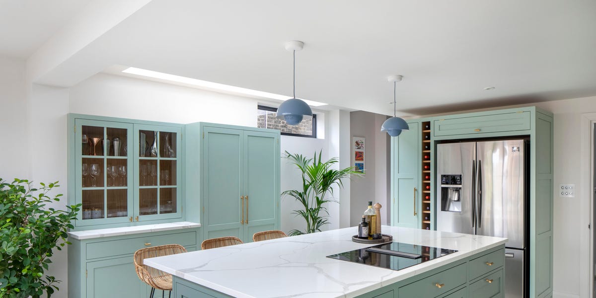 a kitchen with white cabinets a kitchen with white cabinets