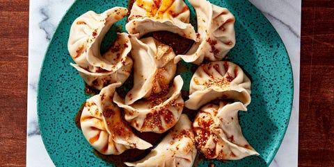 dumplings on a teal plate