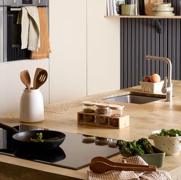 A kitchen with Dunelm Edited Life kitchen range modern kitchen with cooking utensils fresh vegetables and organized storage