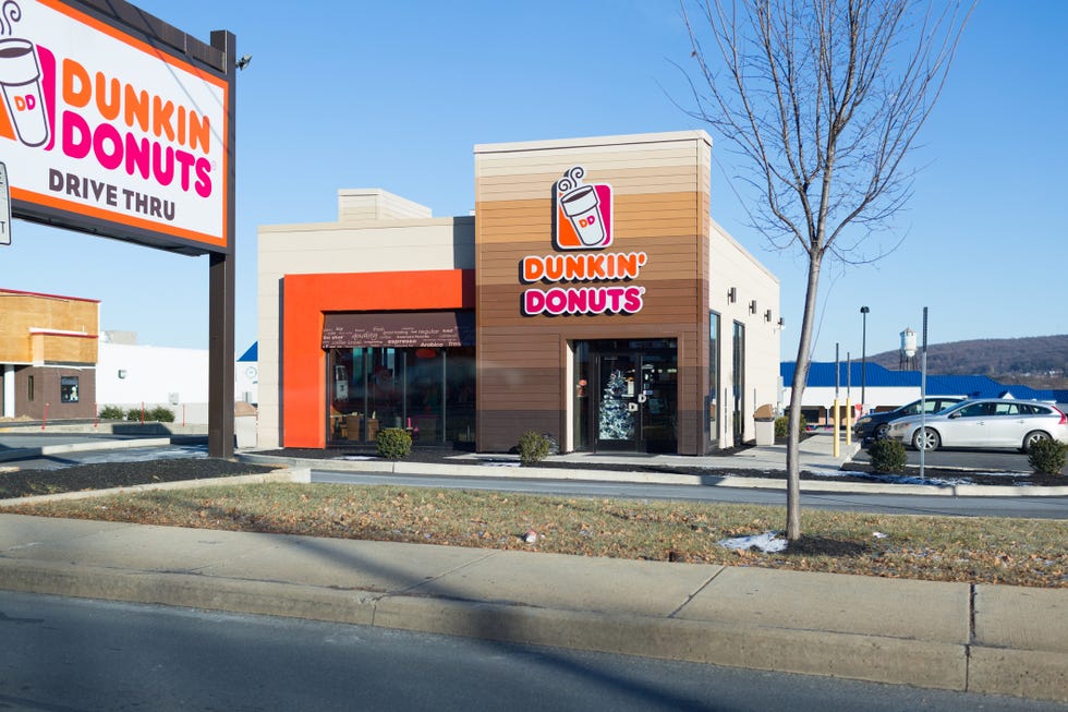 Dunkin' Donuts sign Dunkin' Donuts is an American global donut company and coffeehouse chain