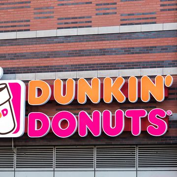 dunkin' donuts sign or logo outside restaurant