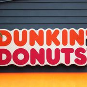 dunkin' donuts sign on a store