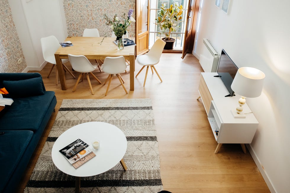 salón comedor con muebles de diseño nórdico