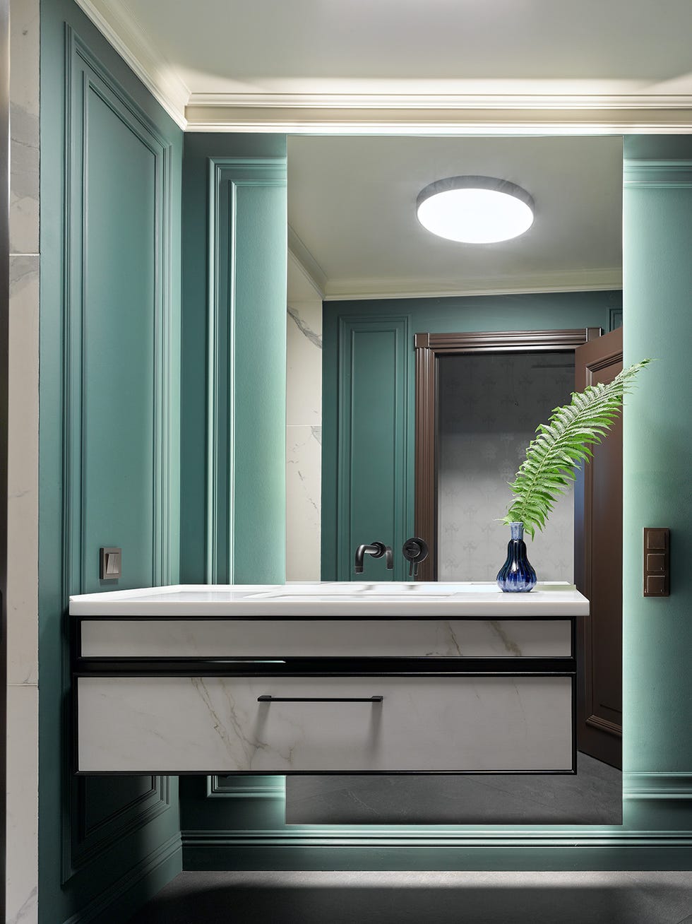baño moderno con mueble suspendido de mármol
