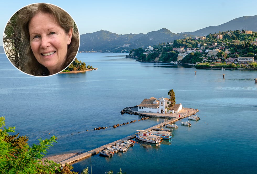corfu, greece 2 june 2022 view of the vlacherna monastery and the mouse island with perama in the background in the evening