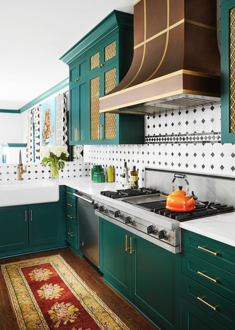 kitchen with dark yet bright green painted cabinets