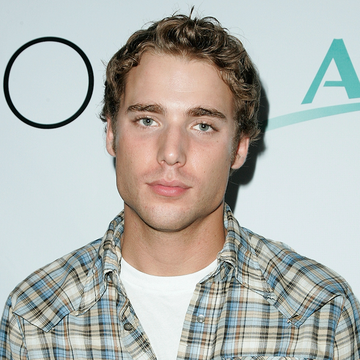 actor dustin milligan arrives at the los angeles premiere party for cw network's "90210" television show on august 23, 2008 in malibu, california
