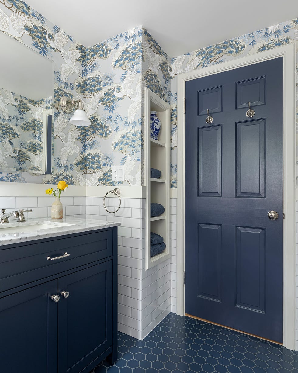 a bathroom with a blue door