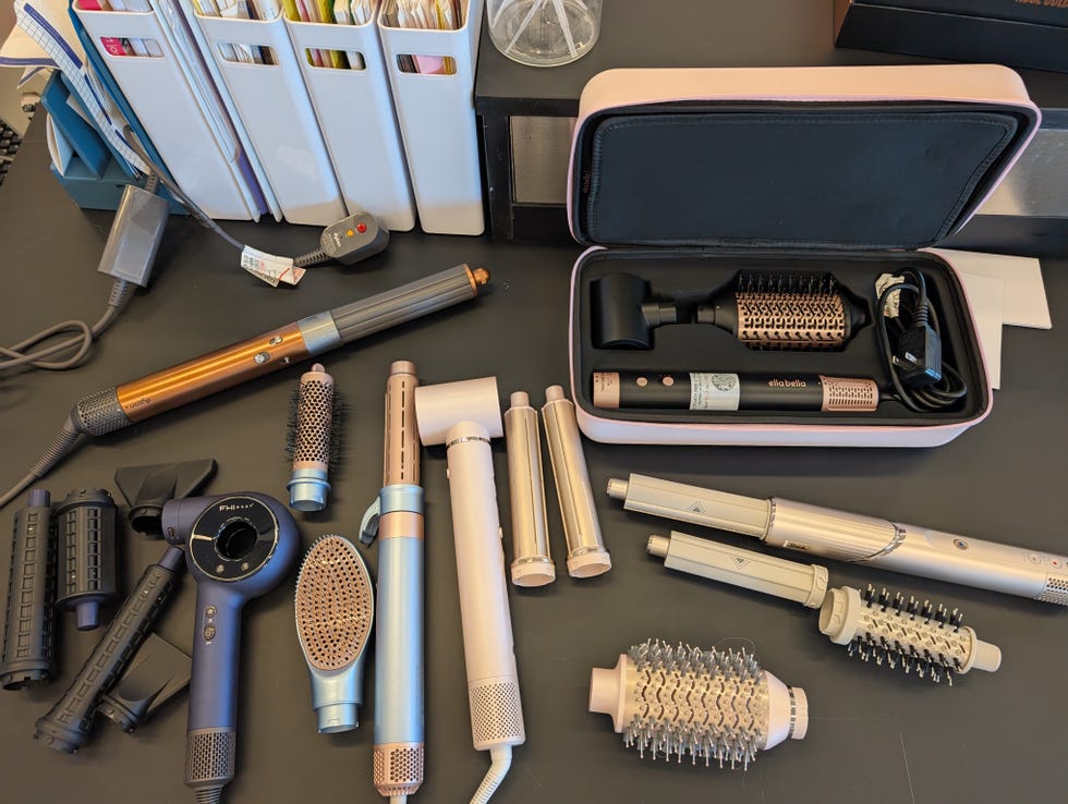 a photo of many of the dyson airwrap dupes being tested at the good housekeeping institute beauty lab