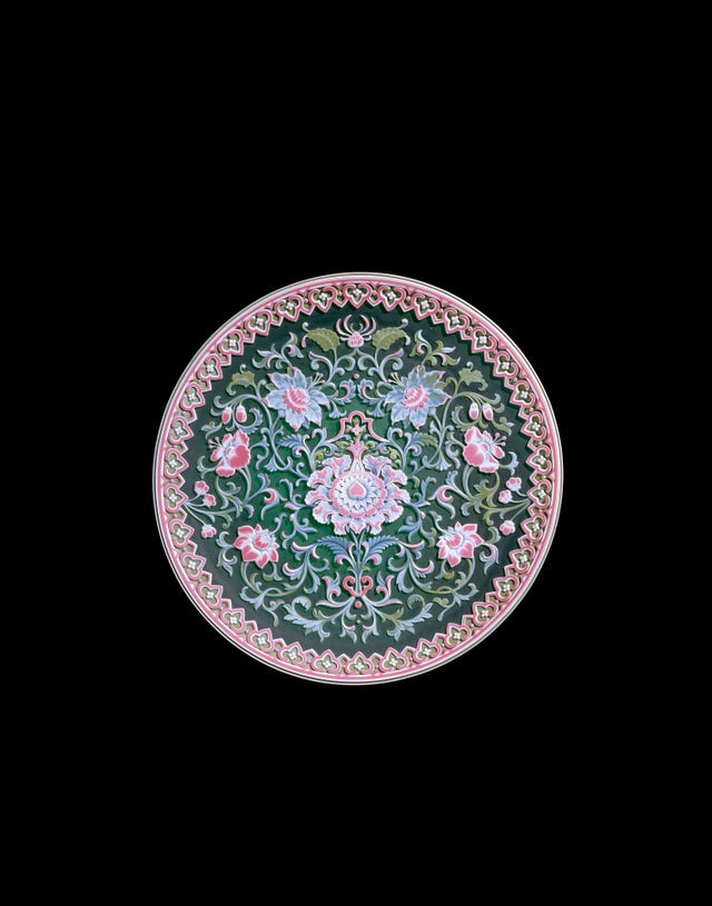 Decorative plate featuring intricate floral patterns.
